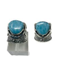 Main product image: "Rare larimar jewelry ring from Dominican Republic Canada"
Close-up stone: "Blue larimar gemstone sterling silver ring handcrafted"
Side view: "Natural larimar ocean stone ring 925 silver GemSilver"
Lifestyle shot: "Caribbean larimar Atlantis stone ring for women Canada"
Detail shot: "Authentic Dominican larimar dolphin stone jewelry ring"
Hand model: "Turquoise blue larimar throat chakra healing ring"