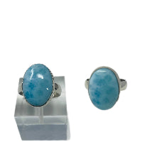 Main product image: "Rare larimar jewelry ring from Dominican Republic Canada"
Close-up stone: "Blue larimar gemstone sterling silver ring handcrafted"
Side view: "Natural larimar ocean stone ring 925 silver GemSilver"
Lifestyle shot: "Caribbean larimar Atlantis stone ring for women Canada"
Detail shot: "Authentic Dominican larimar dolphin stone jewelry ring"
Hand model: "Turquoise blue larimar throat chakra healing ring"